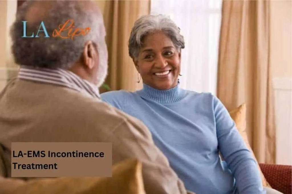 Couple sat smiling at each other - LA-EMS treatment Hampton Court