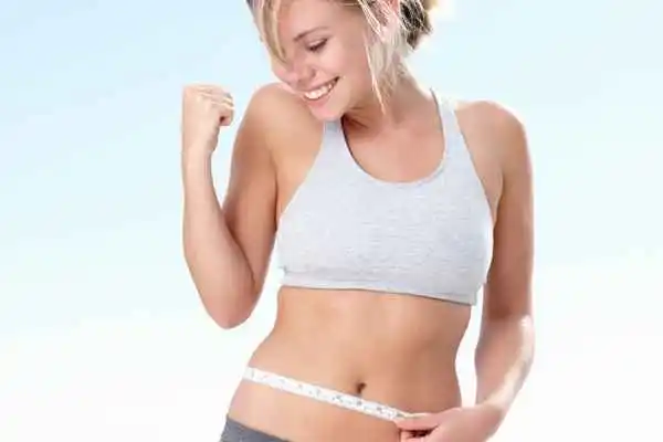 woman happy after fat reduction treatment Hampton Court
