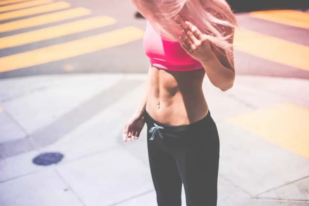 Woman with toned stomach after LA-EMS Body Sculpting Treatment Hampton Court 